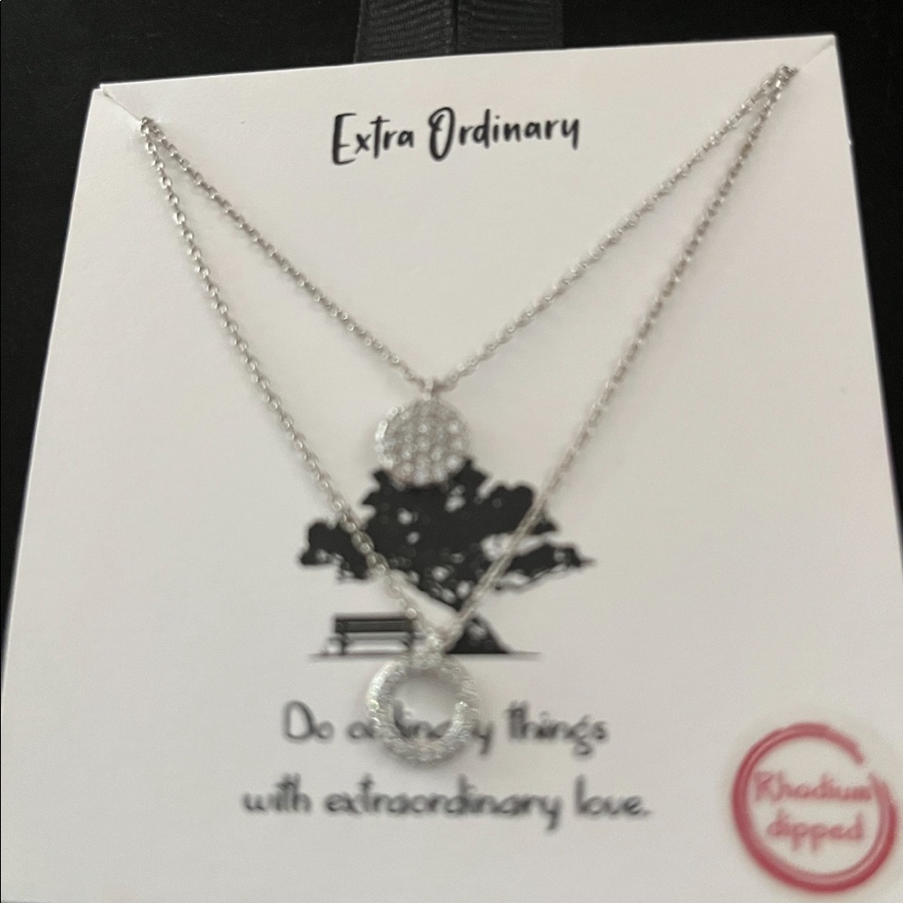 "Do ordinary things with extraordinary love"  18" silver necklace
PRICE  DROP